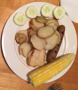 cucumbers, potatoes, corn, and a Field Roast vegan sausage